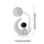 White astronaut lamp with crescent moon design, LED light, and size dimensions displayed.