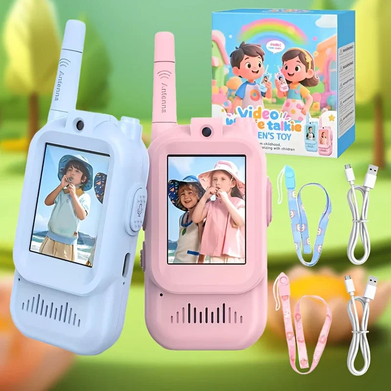 Children's video walkie talkie toy set in blue and pink with screen, box, lanyards, and charging cables