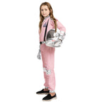 Girl in pink NASA astronaut costume holding helmet, space suit kids dress-up outfit