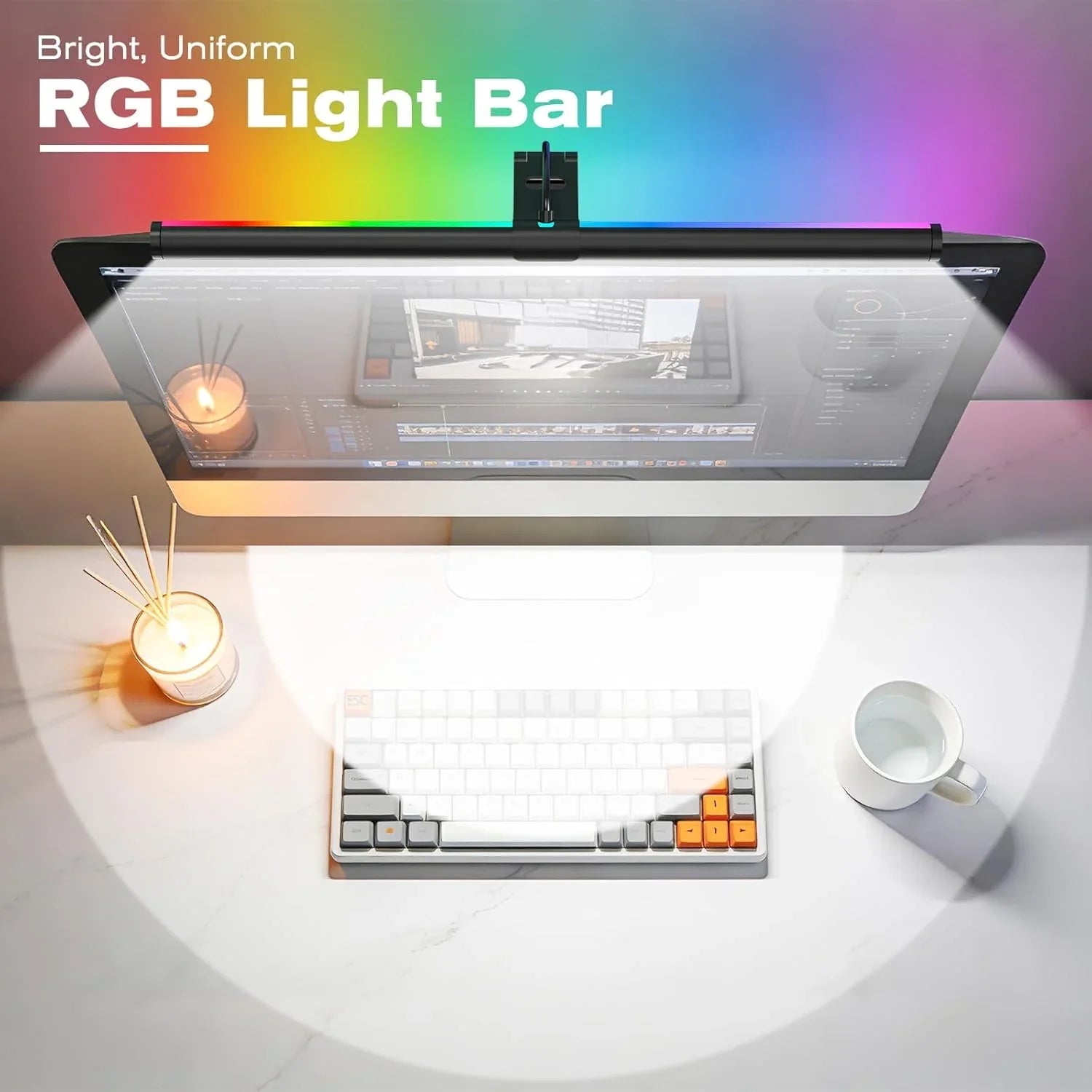RGB light bar mounted on monitor, illuminating desk with keyboard, candle, and cup
