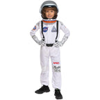 Child wearing white NASA astronaut costume and helmet, standing with hands on hips
