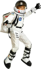 Child wearing white astronaut costume with helmet, NASA patches, and space backpack