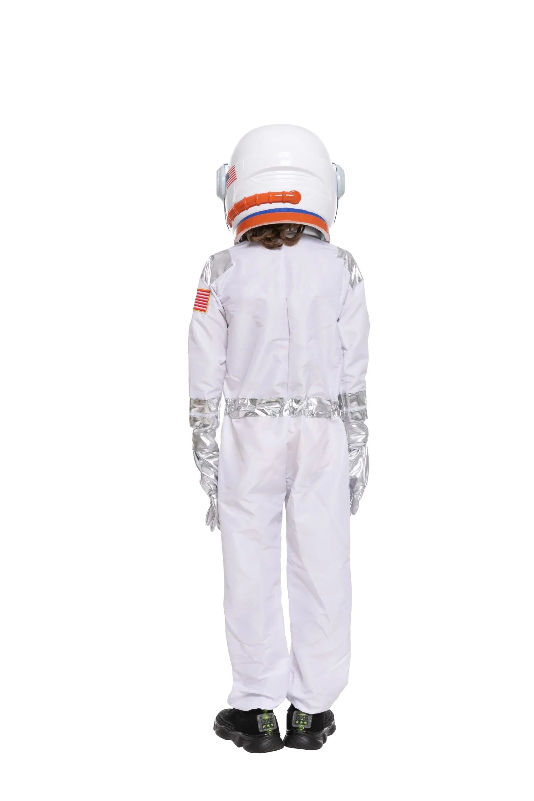Child in astronaut costume with helmet, silver gloves, white suit, and USA flag patch