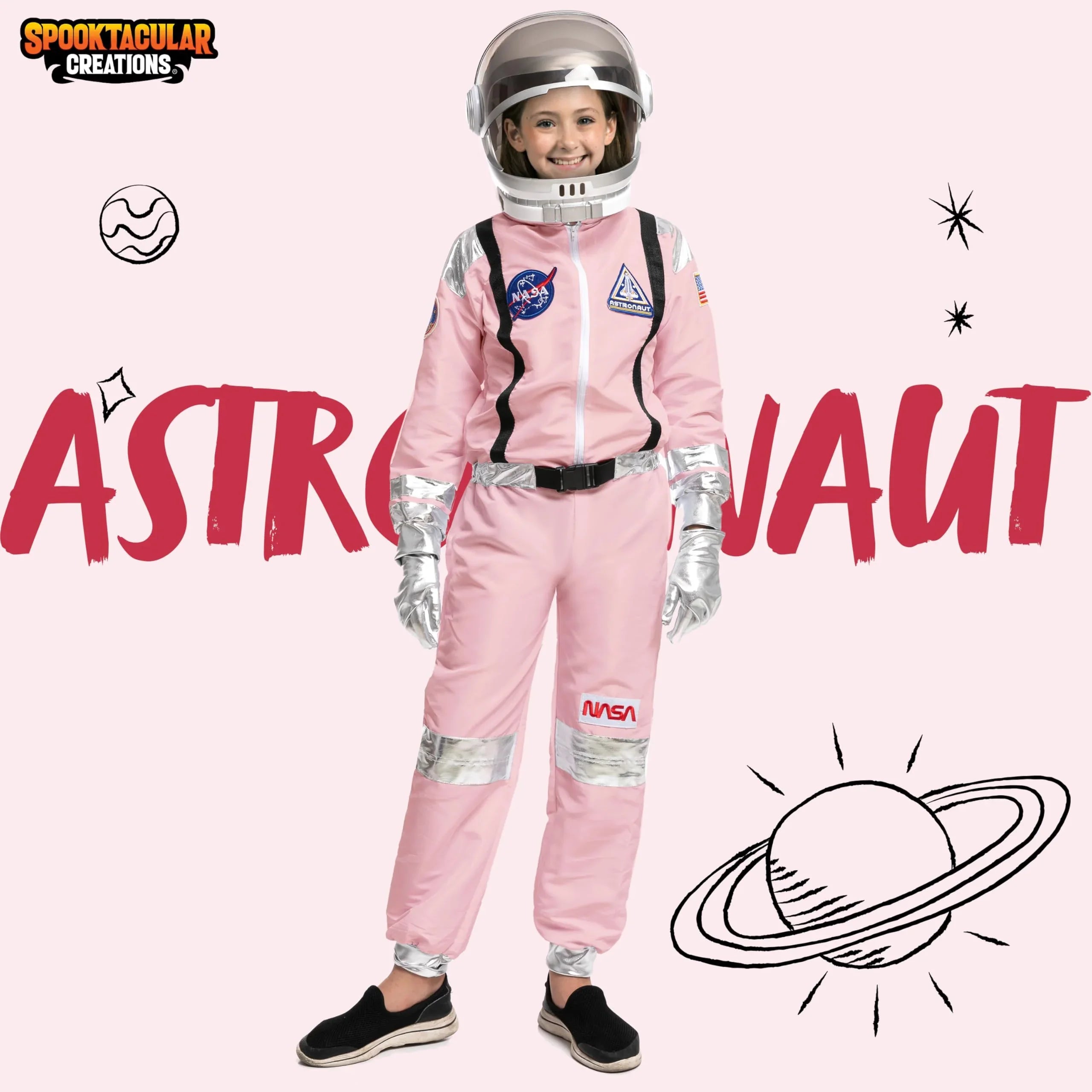 Smiling child wearing a pink astronaut costume with helmet, space patches, and silver gloves