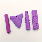 Purple sensory chew toys set with various shapes and textured surfaces