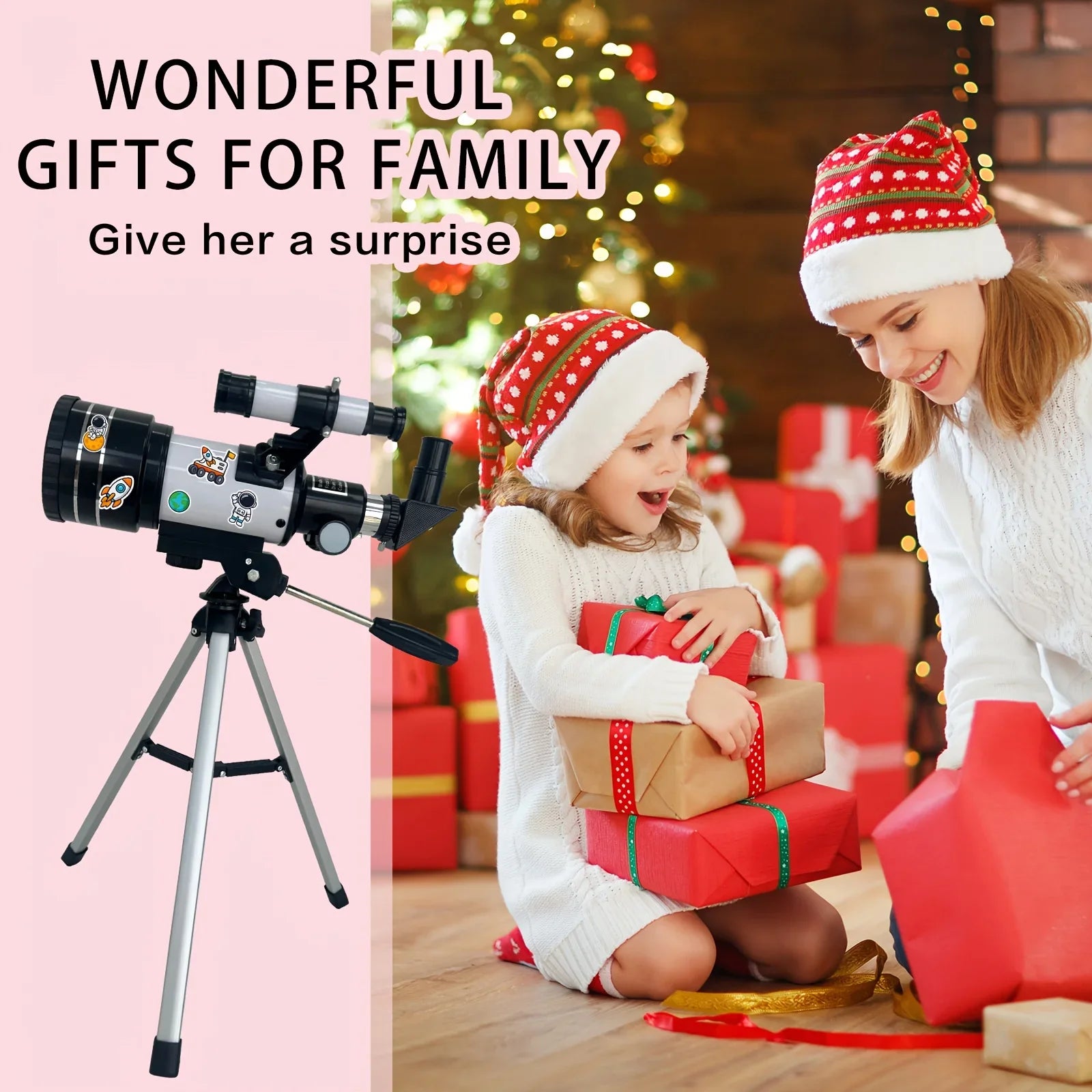 Child and woman in Santa hats opening gifts by Christmas tree, kids telescope displayed