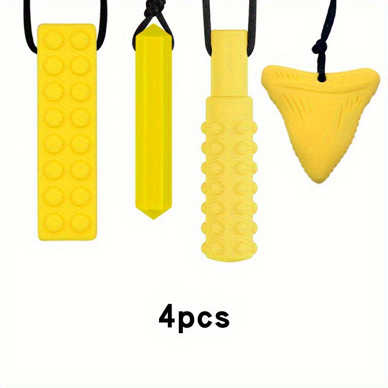 Set of four yellow sensory chew necklaces in assorted shapes for kids, displayed on white background.