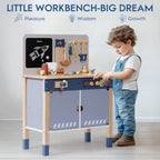 Toddler playing with wooden toy workbench set featuring tools, gears, and learning activities.