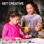 Two kids crafting with stones and glue, decorating a flower pot, creative toys activity.