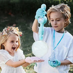Two children playing outdoors with large bubble maker toy and gloves, smiling and excited.