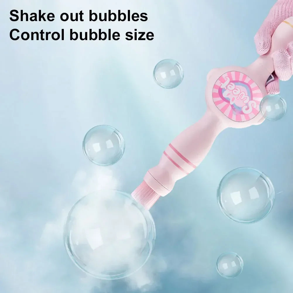 Pink bubble toy wand with gloved hand creating soap bubbles on blue background.