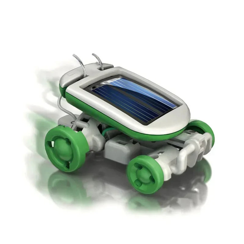 solar powered toy car with green wheels and silver body on white background