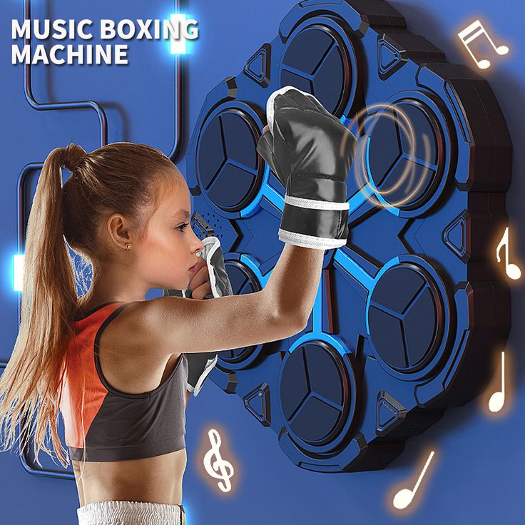 Child using indoor smart music boxing machine with electronic wall target and gloves