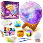 Moon lamp painting kit with paints, brushes, palette, and painted moon models for kids.