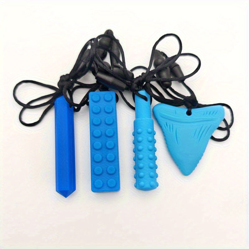 Set of four blue sensory chewable pendant necklaces with various textured shapes.