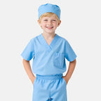 Smiling child in light blue doctor costume with hat, ideal for STEM role play or science learning.