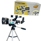 Kids astronomical telescope with space-themed stickers and tripod, product box in background