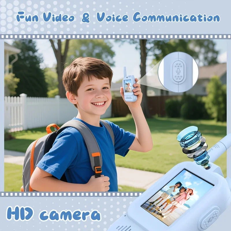 Smiling boy outdoors using kids video walkie talkie with HD camera and voice communication