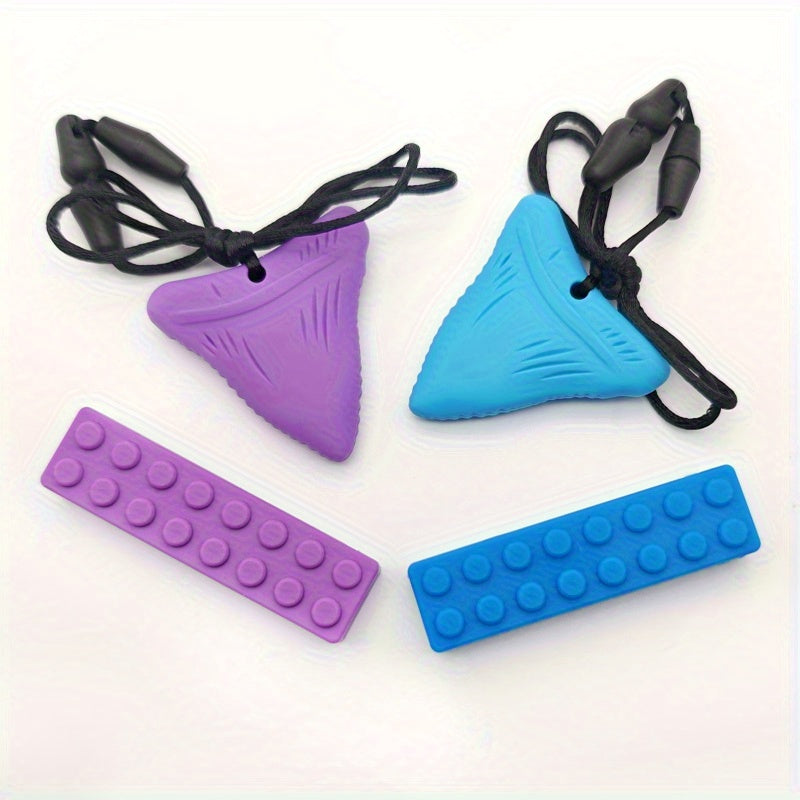 Set of purple and blue sensory chewable necklaces shaped like shark teeth and brick sticks.